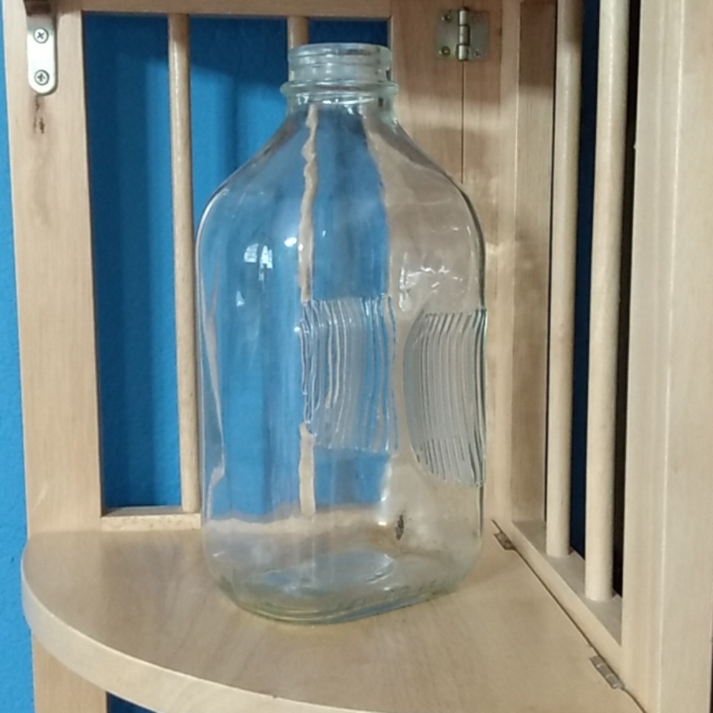 Vintage glass milk jug container